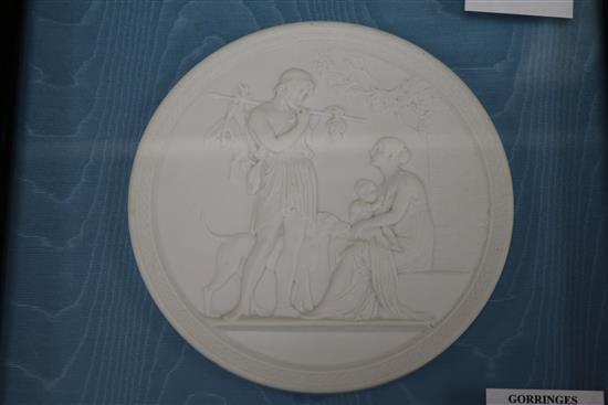 A framed pair of parian plaques and a basalt plaque of Wellington